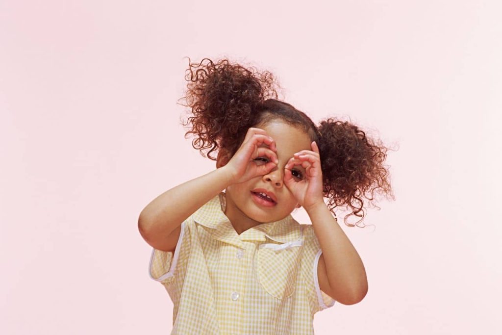 A child playing the "I Spy" game to help with visual discrimination