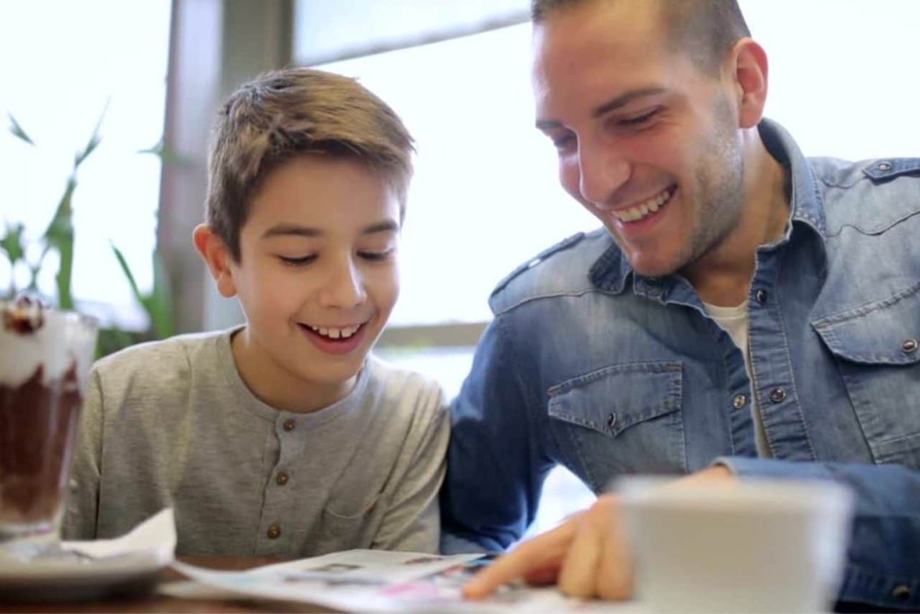 parent reading aloud to their child